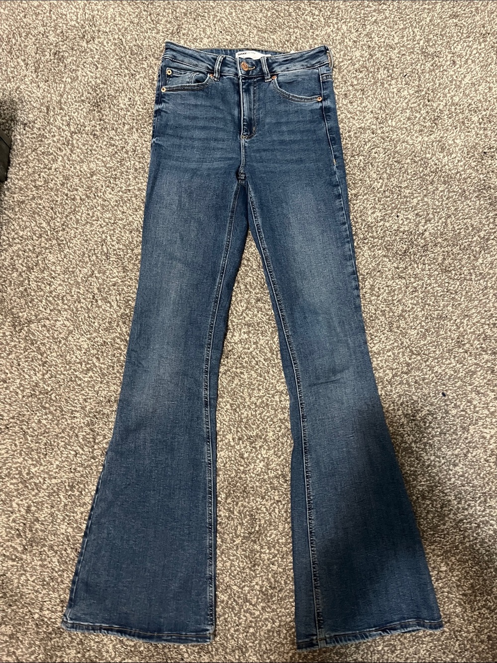 Garage High-Rise Flare Jeans in Medium Blue